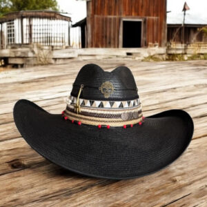 decorated hat, hats decorated in Colombia, personalized hats made from iraca palm, handmade hats with embroidery, test1234, Black Indiana hat decorated with golden skull, tribal bands, coins, and red accents – handcrafted rock-style for women